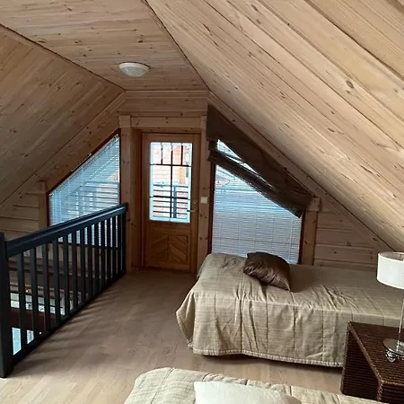 Huvilat Laakson Helmi 1 с камином, сауной, Spa, на берегу озера